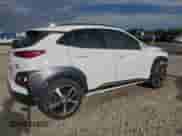 2021 Hyundai Kona Ultimate z VIN KM8K5CA52MU730895, wystawiony jako Copart lot #71620575 z przebiegiem 26 944 mil mil oraz Szkoda całkowita • Salvage title. Historia ofert i sprzedaży dostępna na DreamBid. Obrazek 3.