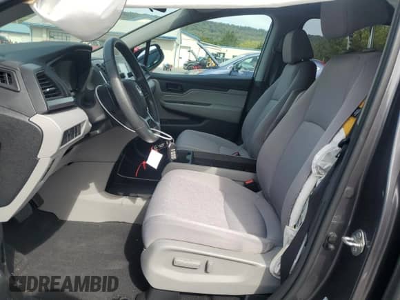 2018 Honda Odyssey LX with VIN 5FNRL6H29JB043696, listed as a Copart auction lot 80569835 with 29,515 mi miles and Salvage title. Bid and sale history available at DreamBid. Image 7.