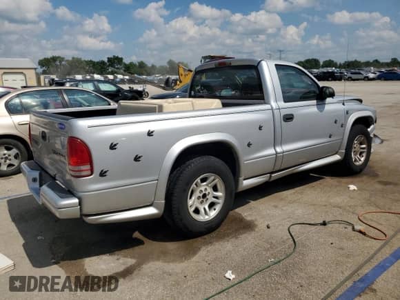 2003 Dodge Dakota с VIN 1D7FL36X53S296882, выставлен на аукционе Copart как лот 61539595 с пробегом 146 601 миль миль и Списание • Salvage title. История ставок и продаж доступна на DreamBid. Изображение 3.