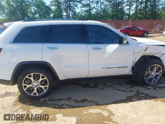 2022 Jeep Grand Cherokee Limited with VIN 1C4RJEBG9NC126472, listed as a IAAI auction lot 42008318 with 77,508 mi miles and . Bid and sale history available at DreamBid. Image 13.