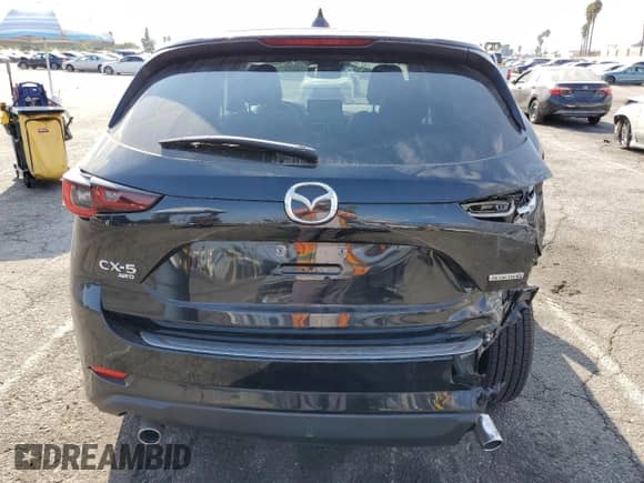 2024 Mazda CX-5 S Preferred z VIN JM3KFBCL5R0421113, wystawiony jako Copart lot #80189985 z przebiegiem 23 283 mil mil oraz Szkoda całkowita • Salvage title. Historia ofert i sprzedaży dostępna na DreamBid. Obrazek 6.