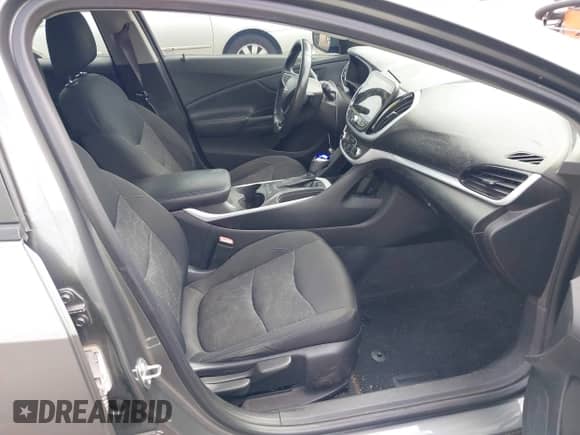 2017 Chevrolet Volt LT z VIN 1G1RA6S56HU119507, wystawiony jako IAAI lot #43145579 z przebiegiem 101 560 mil mil oraz . Historia ofert i sprzedaży dostępna na DreamBid. Obrazek 5.