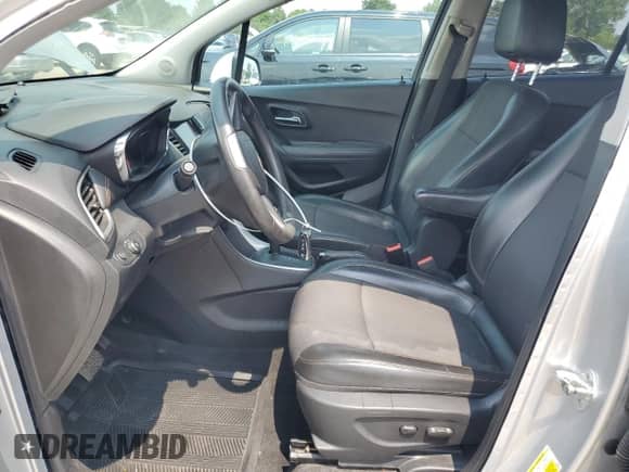 2018 Chevrolet Trax LT with VIN KL7CJPSB5JB550458, listed as a Copart auction lot 66195505 with 127,401 mi miles and Salvage title. Bid and sale history available at DreamBid. Image 7.