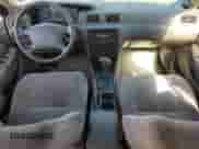 1999 Toyota Camry LE z VIN JT2BG28KXX0359137, wystawiony jako Copart lot #85011045 z przebiegiem 158 951 mil mil oraz Czysty tytuł • Clean title. Historia ofert i sprzedaży dostępna na DreamBid. Obrazek 8.