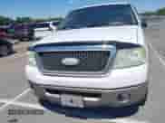 2006 Ford F-150 XLT with VIN 1FTPX12516NA01792, listed as a IAAI auction lot 43124502 with 176,093 mi miles and . Bid and sale history available at DreamBid. Image 6.