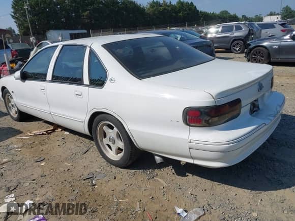 1996 Chevrolet Caprice 1SA Special Value z VIN 1G1BL52P0TR107324, wystawiony jako IAAI lot #42914263 z przebiegiem Nie podano mil oraz . Historia ofert i sprzedaży dostępna na DreamBid. Obrazek 3.