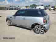 2007 MINI Hardtop with VIN WMWMF33597TT56851, listed as a Copart auction lot 68785325 with 140,683 mi miles and Salvage title. Bid and sale history available at DreamBid. Image 2.