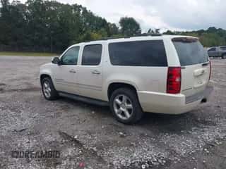 2009 Chevrolet Suburban LTZ z VIN 1GNFC36J39R242199, wystawiony jako IAAI lot #43322206 z przebiegiem 306 353 mil mil oraz . Historia ofert i sprzedaży dostępna na DreamBid. Obrazek 3.