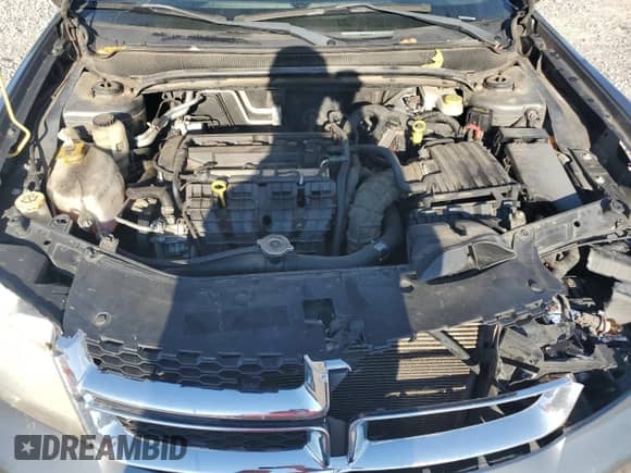 2013 Dodge Avenger SE с VIN 1C3CDZABXDN690388, выставлен на аукционе Copart как лот 71219535 с пробегом 160 942 миль миль и Списание • Salvage title. История ставок и продаж доступна на DreamBid. Изображение 11.