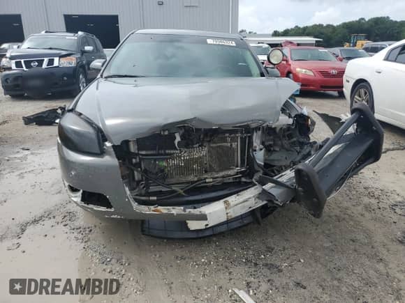 2012 Chevrolet Impala Police Police with VIN 2G1WD5E3XC1162170, listed as a Copart auction lot 70986324 with 148,208 mi miles and Salvage title. Bid and sale history available at DreamBid. Image 5.