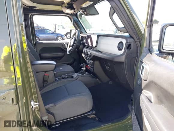 2024 Jeep Wrangler Sport S with VIN 1C4PJXDN0RW107960, listed as a IAAI auction lot 43155437 with 9,103 mi miles and . Bid and sale history available at DreamBid. Image 5.
