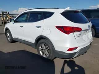 2018 Hyundai Santa Fe 2.4L z VIN 5NMZU3LB2JH058669, wystawiony jako IAAI lot #43306433 z przebiegiem 64 825 mil mil oraz . Historia ofert i sprzedaży dostępna na DreamBid. Obrazek 3.