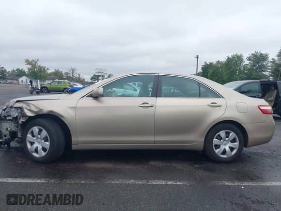 2009 Toyota Camry LE with VIN 4T1BE46K69U859492, listed as a IAAI auction lot 43161261 with 120,180 mi miles and . Bid and sale history available at DreamBid. Image 14.