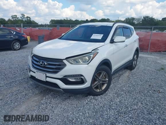 2017 Hyundai Santa Fe 2.4L z VIN 5NMZUDLBXHH027377, wystawiony jako IAAI lot #43341936 z przebiegiem 94 975 mil mil oraz . Historia ofert i sprzedaży dostępna na DreamBid. Obrazek 2.