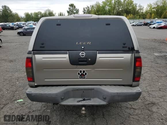 2004 Nissan Frontier XE z VIN 1N6ED29Y34C414129, wystawiony jako Copart lot #73254724 z przebiegiem 247 106 mil mil oraz Szkoda całkowita • Salvage title. Historia ofert i sprzedaży dostępna na DreamBid. Obrazek 6.