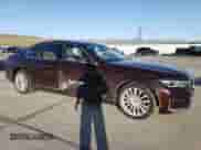 2020 BMW 7 Series with VIN WBA7W4C06LBM70555, listed as a Copart auction lot 52126455 with 37,375 mi miles and Salvage title. Bid and sale history available at DreamBid. Image 4.
