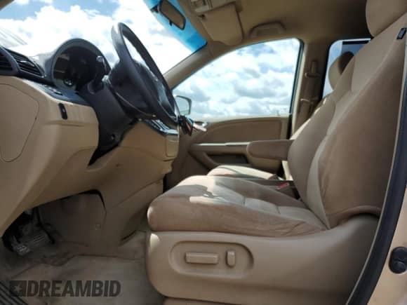 2007 Honda Odyssey EX z VIN 5FNRL384X7B513226, wystawiony jako Copart lot #57396045 z przebiegiem 264 878 mil mil oraz Czysty tytuł • Clean title. Historia ofert i sprzedaży dostępna na DreamBid. Obrazek 7.