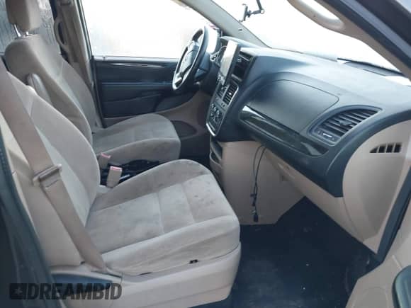 2015 Dodge Grand Caravan SE Plus z VIN 2C4RDGBG9FR721821, wystawiony jako IAAI lot #43465121 z przebiegiem 165 903 mil mil oraz . Historia ofert i sprzedaży dostępna na DreamBid. Obrazek 5.
