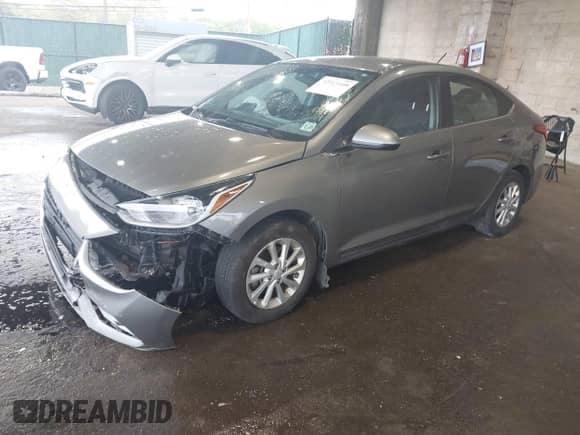 2022 Hyundai Accent SE z VIN 3KPC24A60NE179043, wystawiony jako IAAI lot #42313448 z przebiegiem 66 700 mil mil oraz . Historia ofert i sprzedaży dostępna na DreamBid. Obrazek 18.