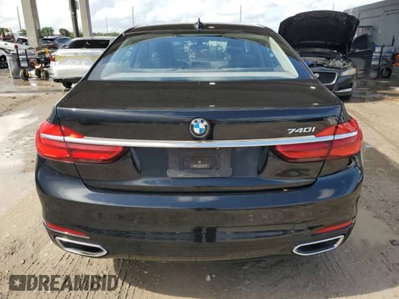 2018 BMW 7 Series 740i with VIN WBA7E2C5XJG742432, listed as a Copart auction lot 70258945 with 65,223 mi miles and Salvage title. Bid and sale history available at DreamBid. Image 6.