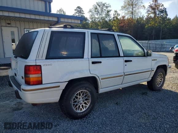 1993 Jeep Grand Cherokee Limited z VIN 1J4GZ78Y1PC697768, wystawiony jako Copart lot #85178745 z przebiegiem 152 032 mil mil oraz Szkoda całkowita • Salvage title. Historia ofert i sprzedaży dostępna na DreamBid. Obrazek 3.
