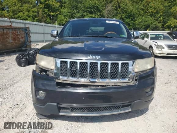 2011 Jeep Grand Cherokee Overland Summit with VIN 1J4RR6GT6BC576672, listed as a Copart auction lot 68143155 with 152,077 mi miles and Salvage title. Bid and sale history available at DreamBid. Image 5.