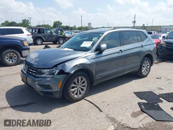 2018 Volkswagen Tiguan S с VIN 3VV1B7AX1JM106539, выставлен на аукционе IAAI как лот 42735914 с пробегом 89 055 миль миль и . История ставок и продаж доступна на DreamBid. Изображение 17.
