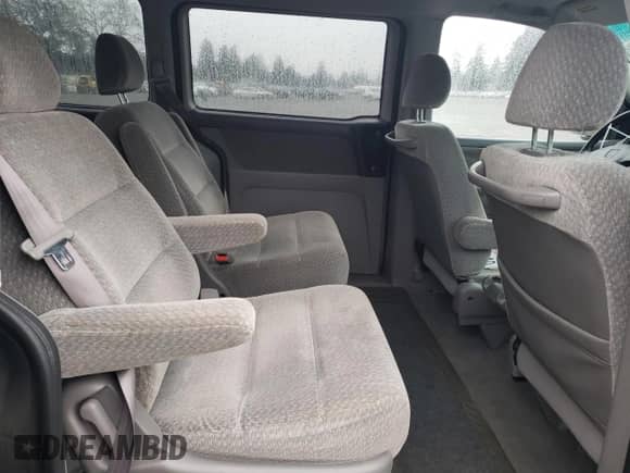 1999 Honda Odyssey LX with VIN 2HKRL185XXH510695, listed as a Copart auction lot 84907294 with 157,608 mi miles and Salvage title. Bid and sale history available at DreamBid. Image 11.