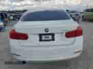 2018 BMW 3 Series 320i with VIN WBA8E1G58JNU89244, listed as a Copart auction lot 81389415 with 61,309 mi miles and Salvage title. Bid and sale history available at DreamBid. Image 6.