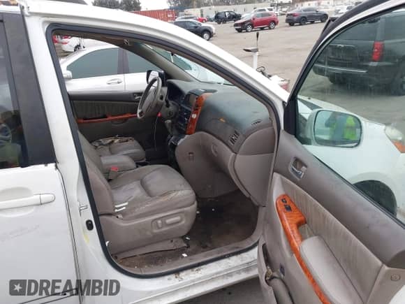 2009 Toyota Sienna XLE with VIN 5TDZK22C19S235473, listed as a IAAI auction lot 43376158 with 110,574 mi miles and . Bid and sale history available at DreamBid. Image 5.