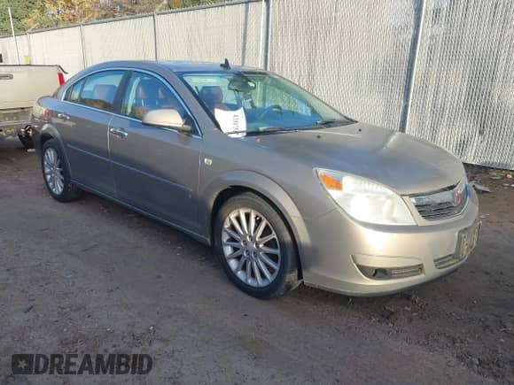 2007 Saturn Aura XR z VIN 1G8ZV57797F219890, wystawiony jako IAAI lot #43501676 z przebiegiem 172 341 mil mil oraz . Historia ofert i sprzedaży dostępna na DreamBid. Obrazek 1.