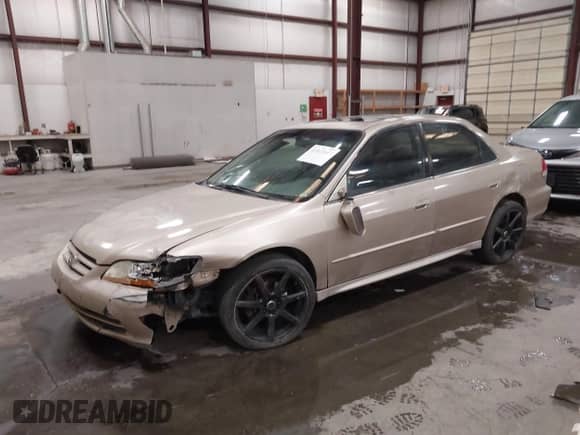 2001 Honda Accord EX с VIN 1HGCG16501A076753, выставлен на аукционе IAAI как лот 43313147 с пробегом 236 122 миль миль и . История ставок и продаж доступна на DreamBid. Изображение 20.