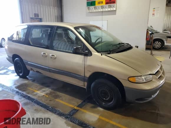 1999 Dodge Caravan SE with VIN 1B4GP44G1XB867914, listed as a Copart auction lot 67830785 with 141,875 mi miles and Salvage title. Bid and sale history available at DreamBid. Image 4.