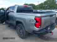 2023 Chevrolet Colorado 4WD Z71 with VIN 1GCPTDEK3P1235293, listed as a IAAI auction lot 42927062 with 31,492 mi miles and . Bid and sale history available at DreamBid. Image 3.