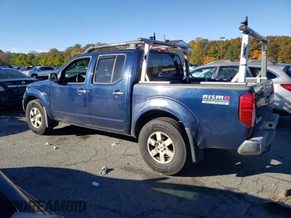 2006 Nissan Frontier SE with VIN 1N6AD07W86C401240, listed as a Copart auction lot 87023625 with 252,639 mi miles and Salvage title. Bid and sale history available at DreamBid. Image 2.