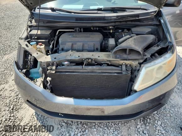 2011 Honda Odyssey LX with VIN 5FNRL5H20BB037071, listed as a Copart auction lot 81141515 with 236,560 mi miles and Salvage title. Bid and sale history available at DreamBid. Image 12.