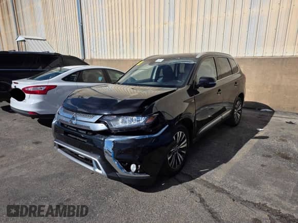 2020 Mitsubishi Outlander SE с VIN JA4AD3A37LZ031551, выставлен на аукционе Copart как лот 90901275 с пробегом 87 218 миль миль и Чистый • Clean title. История ставок и продаж доступна на DreamBid. Изображение 2.