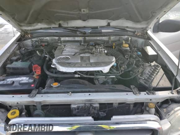 2002 Nissan Pathfinder SE with VIN JN8DR09Y92W702760, listed as a Copart auction lot 44083625 with 289,910 mi miles and Clean title. Bid and sale history available at DreamBid. Image 12.