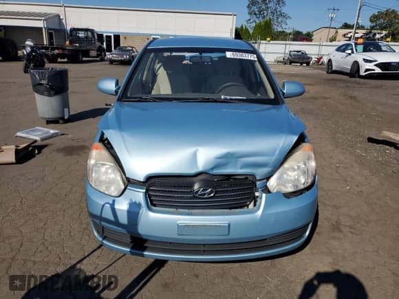 2009 Hyundai Accent Auto GLS z VIN KMHCN46CX9U333847, wystawiony jako Copart lot #69383775 z przebiegiem 144 793 mil mil oraz Szkoda całkowita • Salvage title. Historia ofert i sprzedaży dostępna na DreamBid. Obrazek 5.