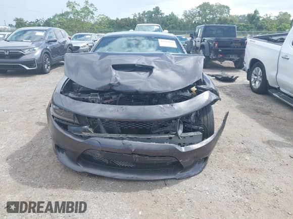 2022 Dodge Charger GT z VIN 2C3CDXHG3NH119728, wystawiony jako IAAI lot #43361678 z przebiegiem 85 014 mil mil oraz . Historia ofert i sprzedaży dostępna na DreamBid. Obrazek 12.