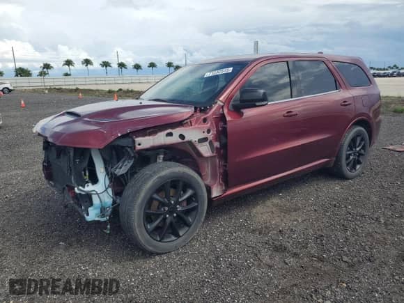 2018 Dodge Durango GT with VIN 1C4RDHDG5JC403229, listed as a Copart auction lot 71232515 with 128,343 mi miles and Salvage title. Bid and sale history available at DreamBid. Image 1.