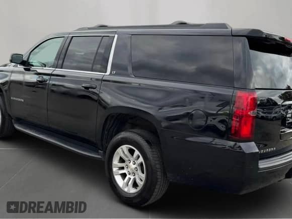 2020 Chevrolet Suburban LT with VIN 1GNSKHKC9LR244519, listed as a Copart auction lot 90947705 with 173,286 mi miles and Clean title. Bid and sale history available at DreamBid. Image 3.