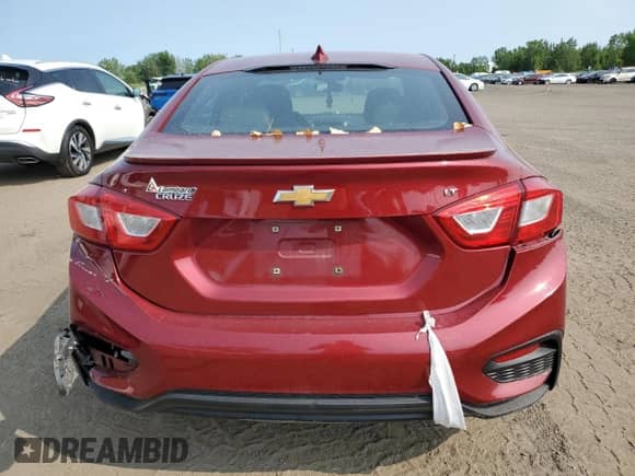 2018 Chevrolet Cruze LT with VIN 1G1BE5SM5J7146757, listed as a Copart auction lot 67346215 with 85,962 mi miles and Salvage title. Bid and sale history available at DreamBid. Image 6.