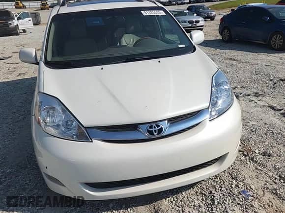 2010 Toyota Sienna XLE Limited с VIN 5TDYK4CC5AS300190, выставлен на аукционе Copart как лот 81425525 с пробегом 184 712 миль миль и Списание • Salvage title. История ставок и продаж доступна на DreamBid. Изображение 13.