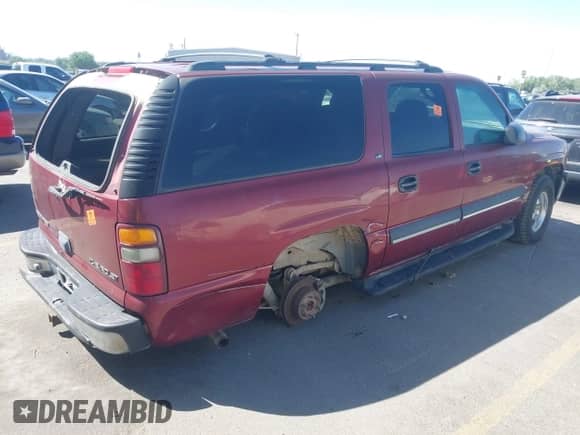 2002 Chevrolet Suburban LT z VIN 1GNFK16Z02J110518, wystawiony jako IAAI lot #42672175 z przebiegiem Nie podano mil oraz . Historia ofert i sprzedaży dostępna na DreamBid. Obrazek 4.