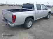 2010 Chevrolet Colorado 1LT z VIN 1GCJTCDEXA8114061, wystawiony jako IAAI lot #42235820 z przebiegiem 218 972 mil mil oraz . Historia ofert i sprzedaży dostępna na DreamBid. Obrazek 4.