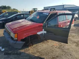 1996 Jeep Grand Cherokee Laredo with VIN 1J4GZ58S3TC312320, listed as a Copart auction lot 68771385 with 166,284 mi miles and Non repairable. Bid and sale history available at DreamBid. Image 1.