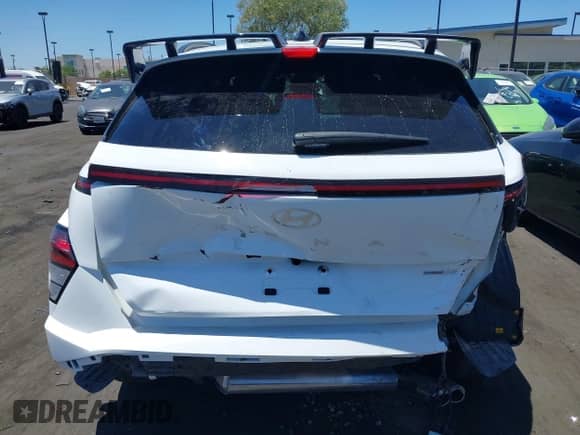 2025 Hyundai Kona N Line S with VIN KM8HBCA35SU199643, listed as a IAAI auction lot 42682810 with 6,441 mi miles and . Bid and sale history available at DreamBid. Image 17.