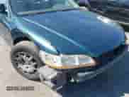 2002 Honda Accord LX with VIN JHMCG66522C014027, listed as a IAAI auction lot 42910646 with 225,058 mi miles and . Bid and sale history available at DreamBid. Image 6.