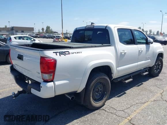 2017 Toyota Tacoma SR5 with VIN 3TMAZ5CN1HM037971, listed as a IAAI auction lot 42658632 with 67,228 mi miles and . Bid and sale history available at DreamBid. Image 4.